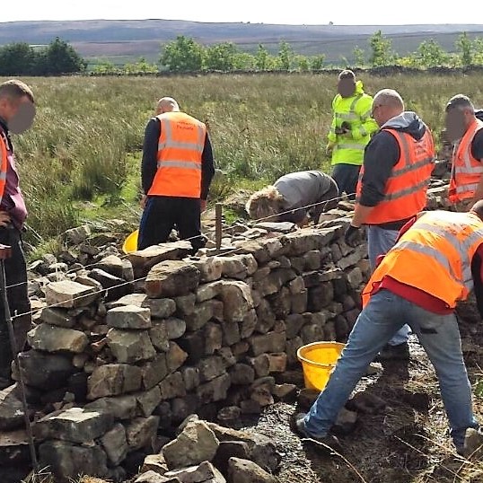 Offenders ‘building blocks’ to restore North Yorkshire’s dry stone walls image